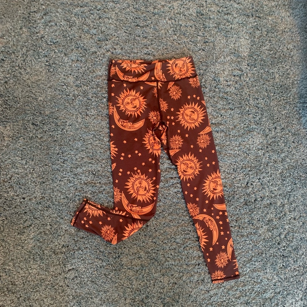 Hemp sun looking leggings orange and black small